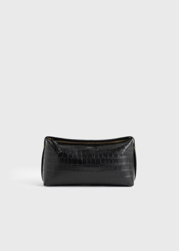 Belted croco-embossed clutch black sold by Toteme
