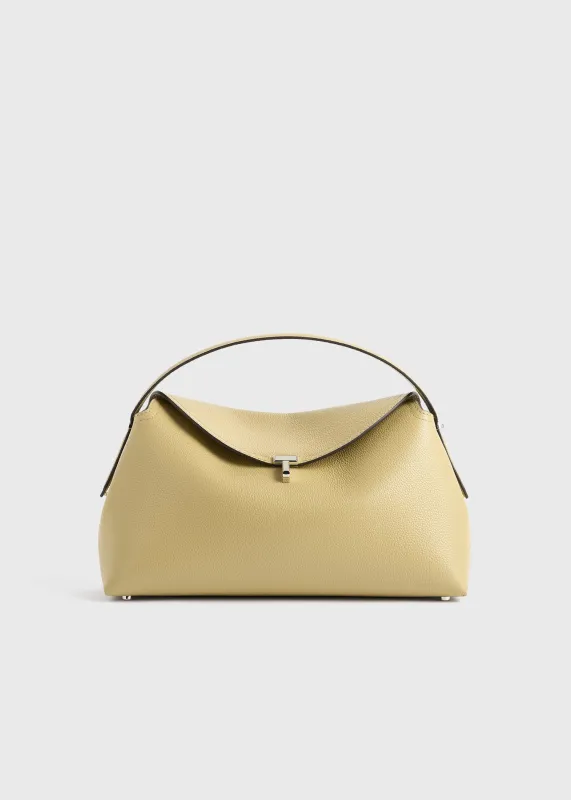 T-Lock grained-leather top handle desert sold by Toteme