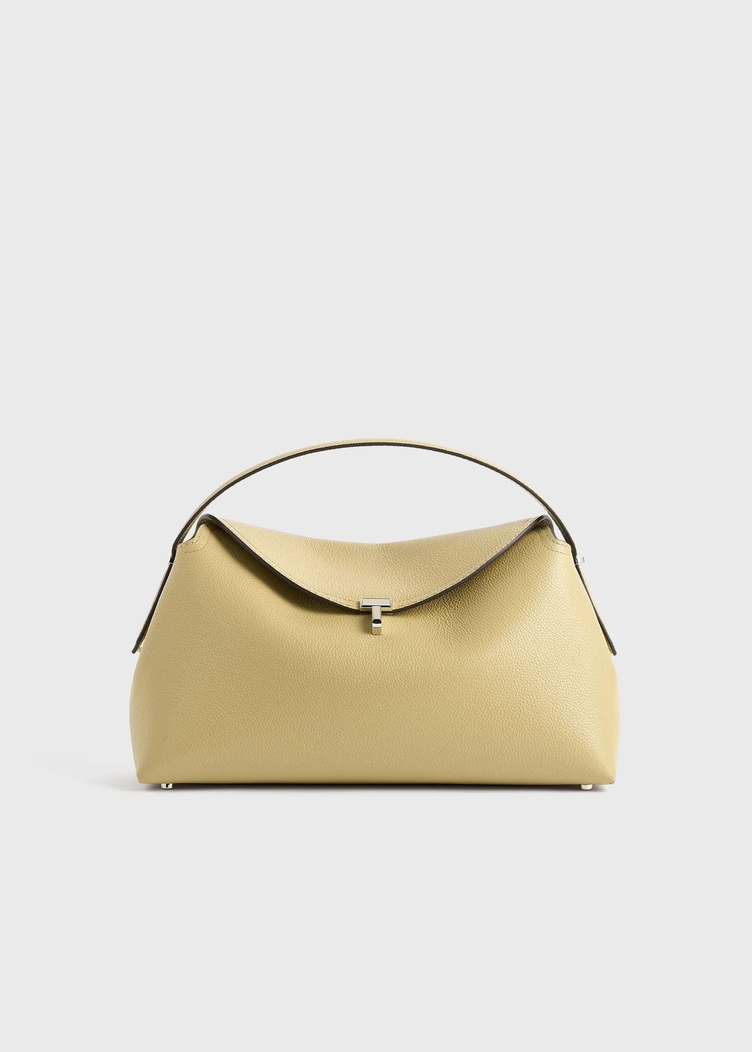 T-lock grained-leather top handle desert sold by Toteme