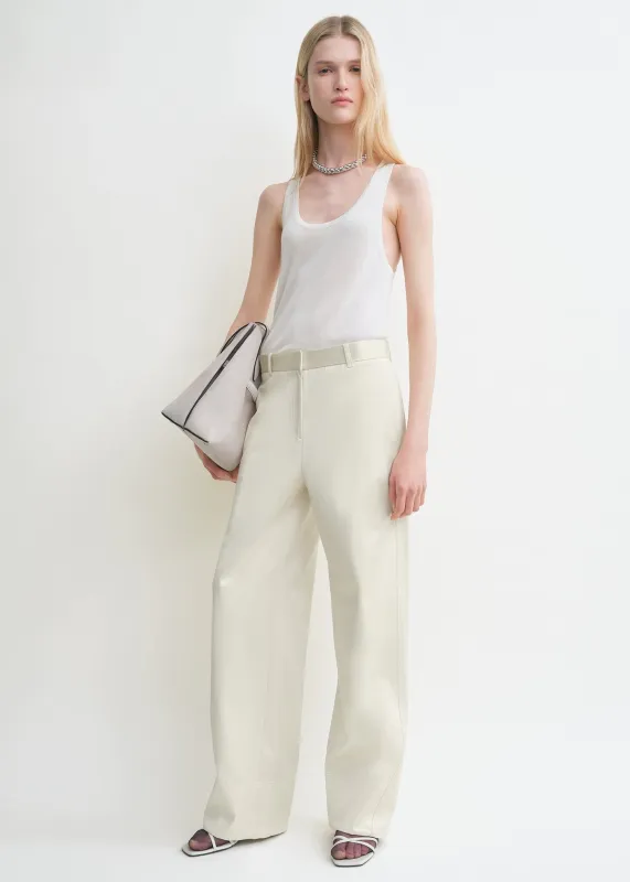 Twisted seam trousers ecru sold by Toteme