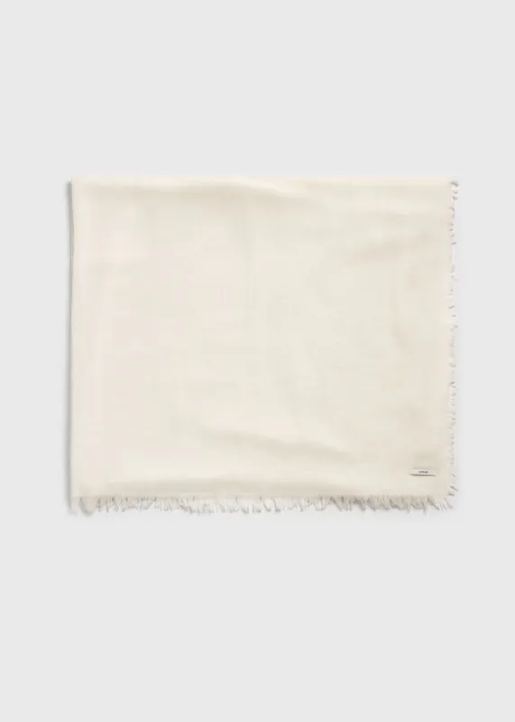 Light wool blanket scarf off-white sold by Toteme