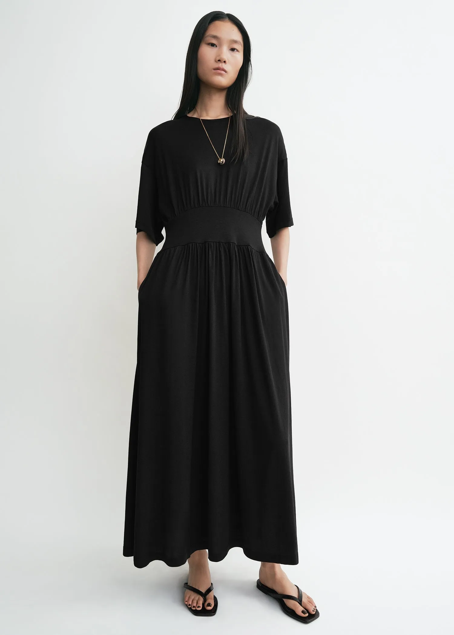 Cotton silk tee dress black sold by Toteme