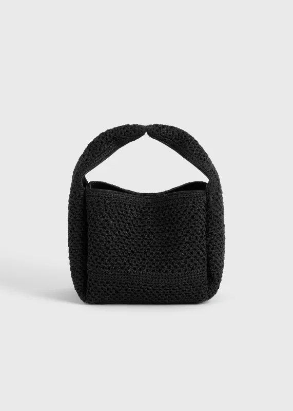 Petite crochet bucket bag black sold by Toteme