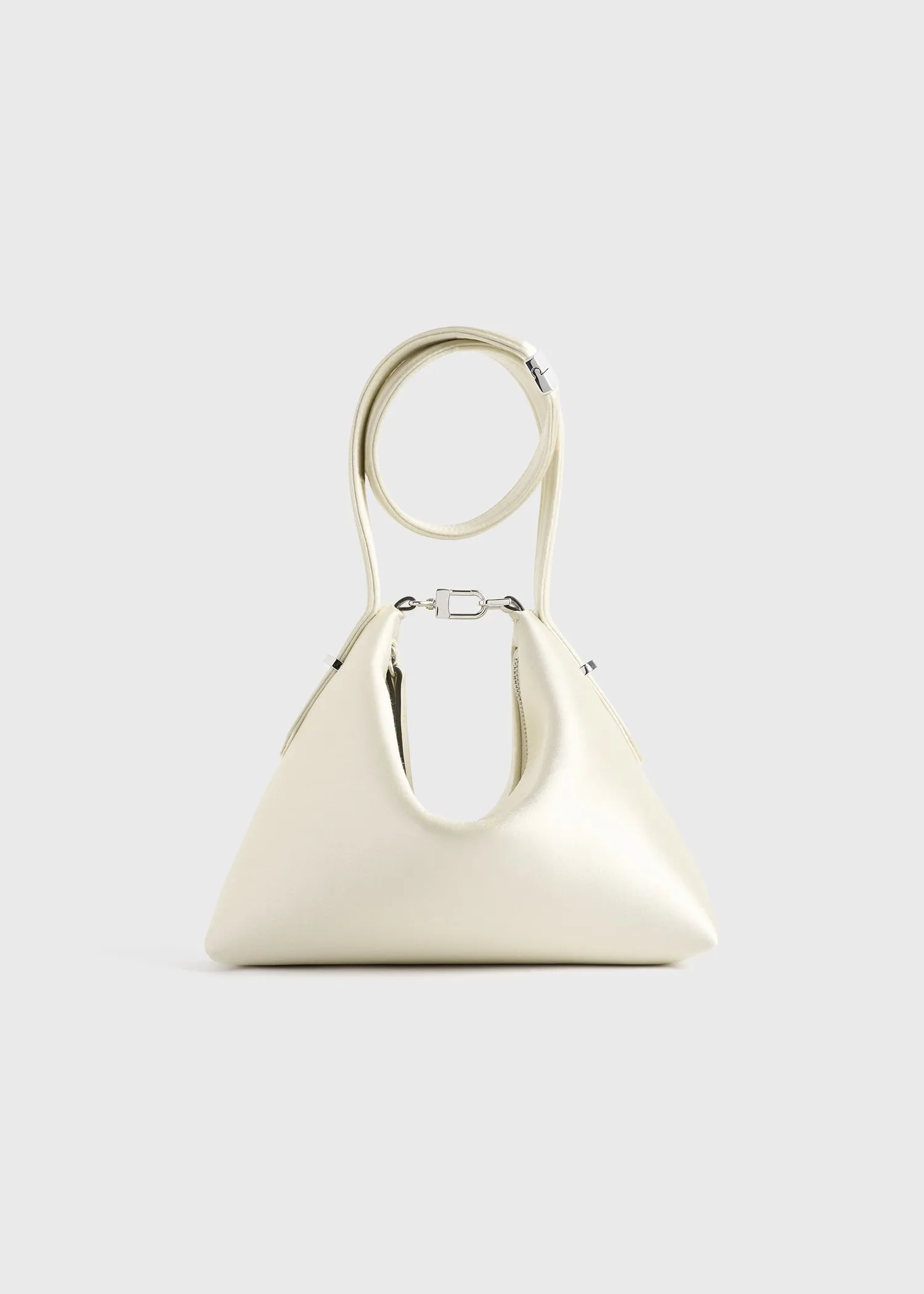 Bevel satin wristlet ecru sold by Toteme