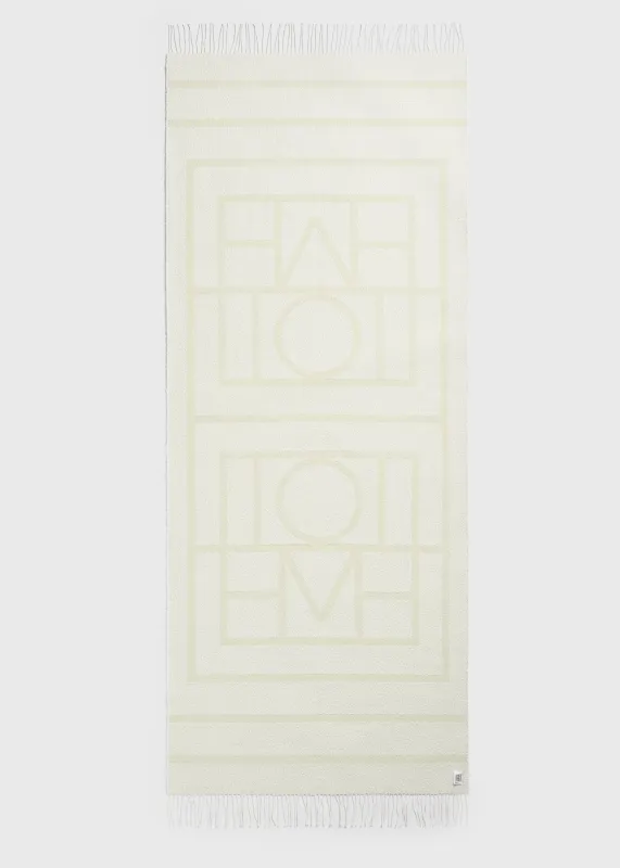 Monogram jacquard sarong ecru/straw made by Toteme