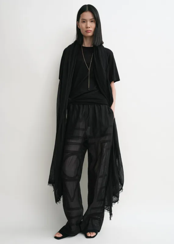 Monogram crochet pj bottoms black sold by Toteme