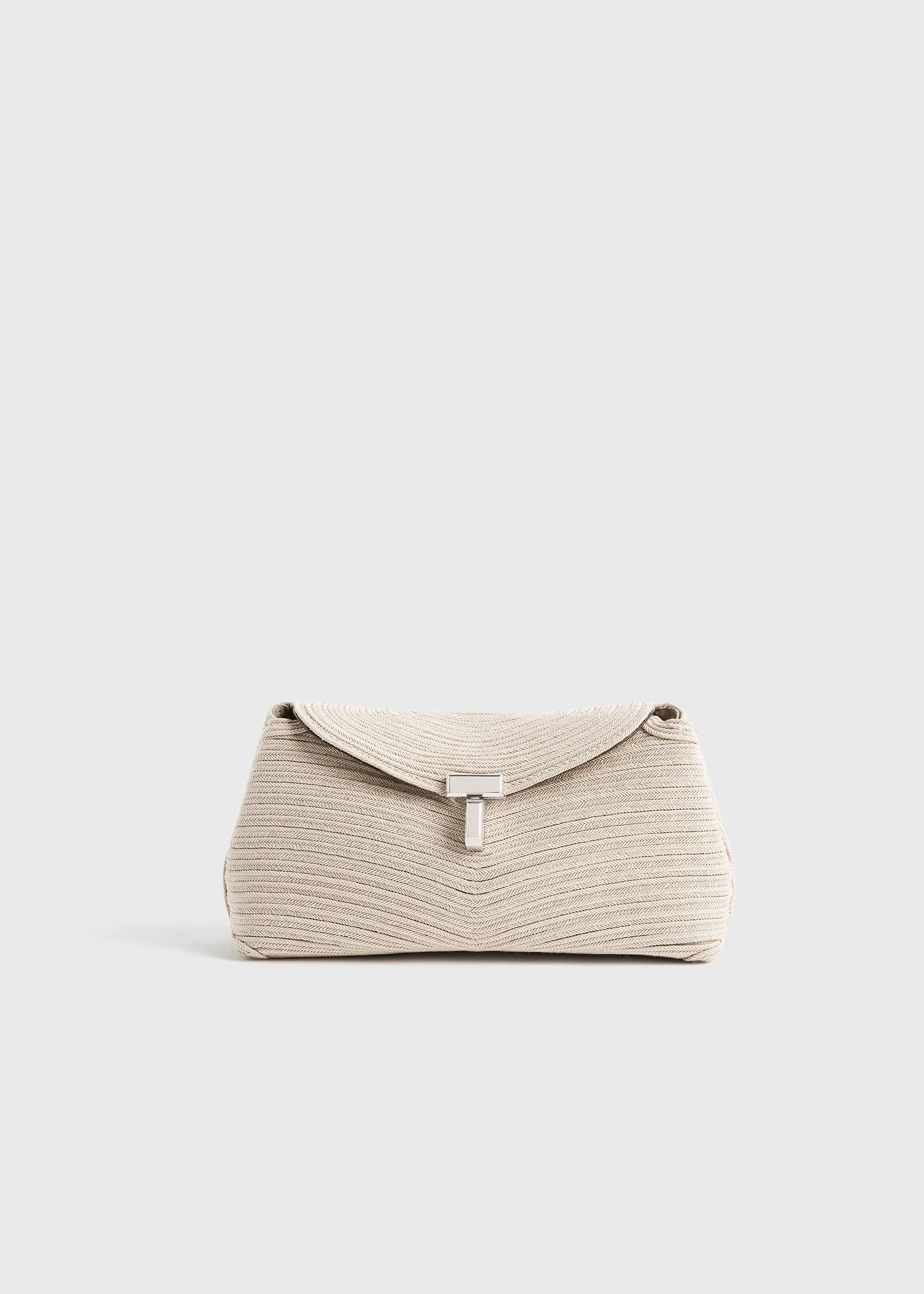 Mini T-lock rope clutch pearl sold by Toteme