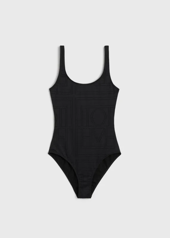 Monogram pointelle swimsuit black sold by Toteme