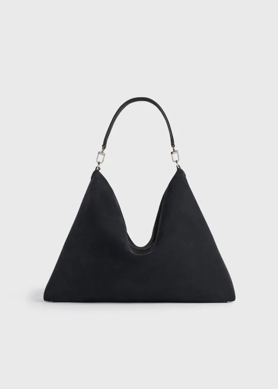 Bevel suede bag navy made by Toteme