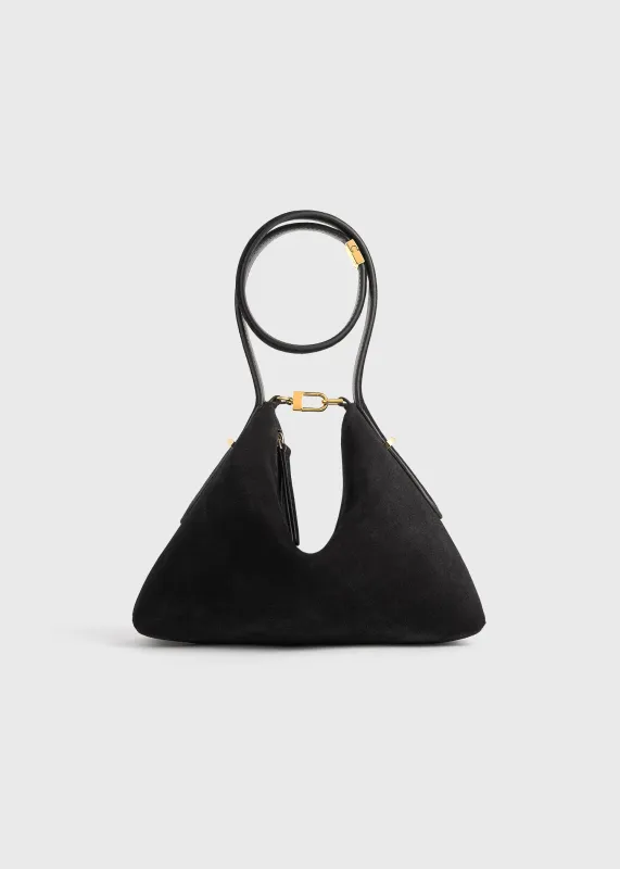 Bevel suede wristlet black sold by Toteme