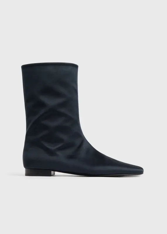 Satin ankle boots navy sold by Toteme