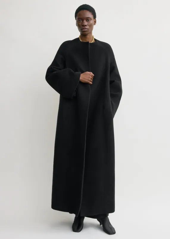 Bell-sleeve coat black sold by Toteme