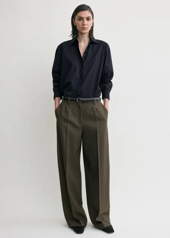 Wide tailored trousers forest sold by Toteme