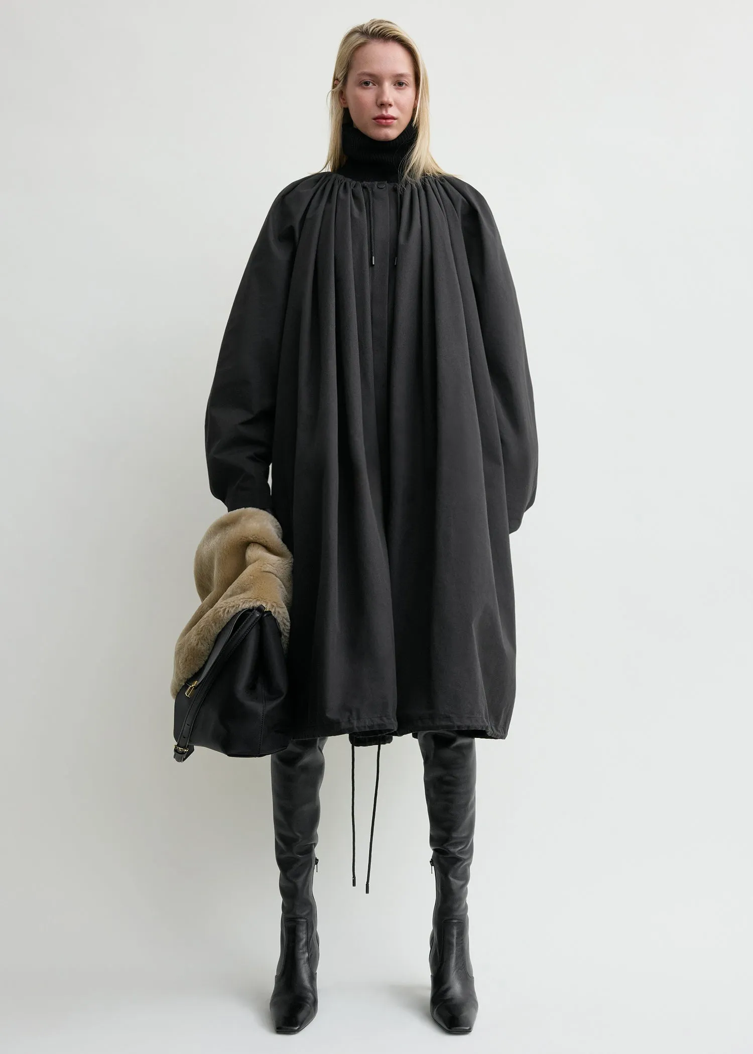 Gathered parachute coat black sold by Toteme