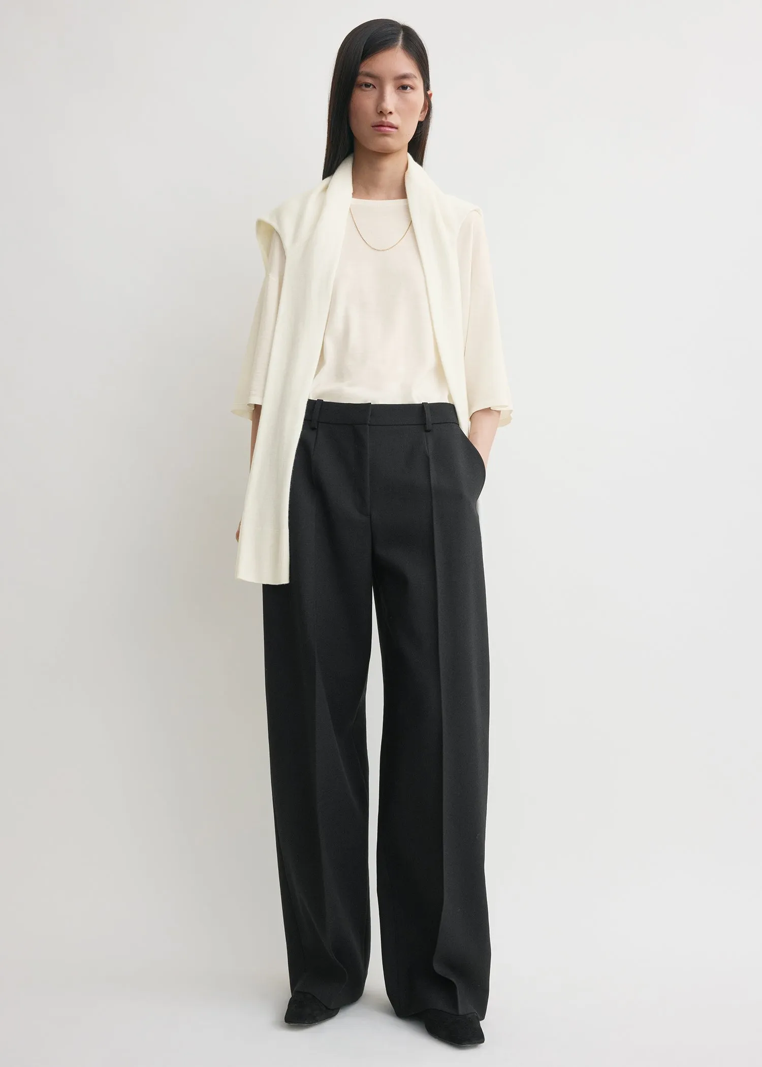 Wide tailored trousers black sold by Toteme