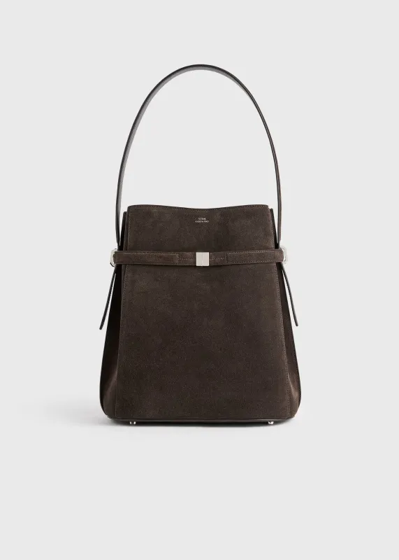 Belted suede bucket bag brown sold by Toteme