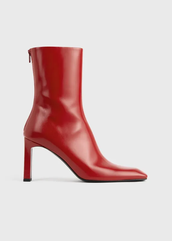 Bar glossy leather boots red sold by Toteme