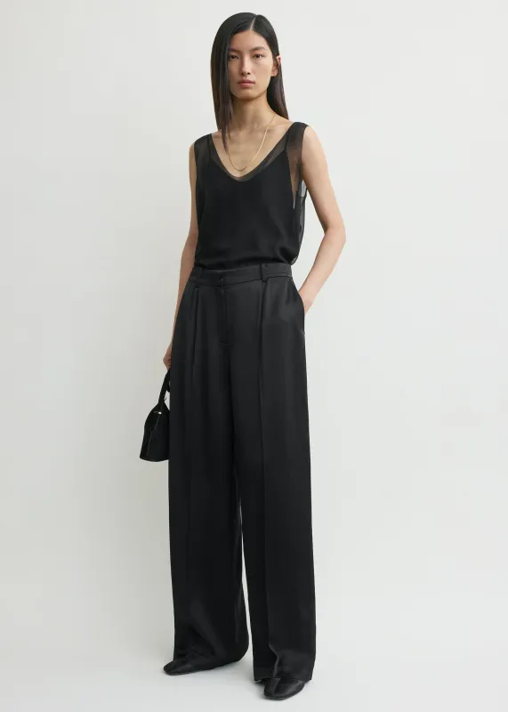 Wide satin trousers black sold by Toteme