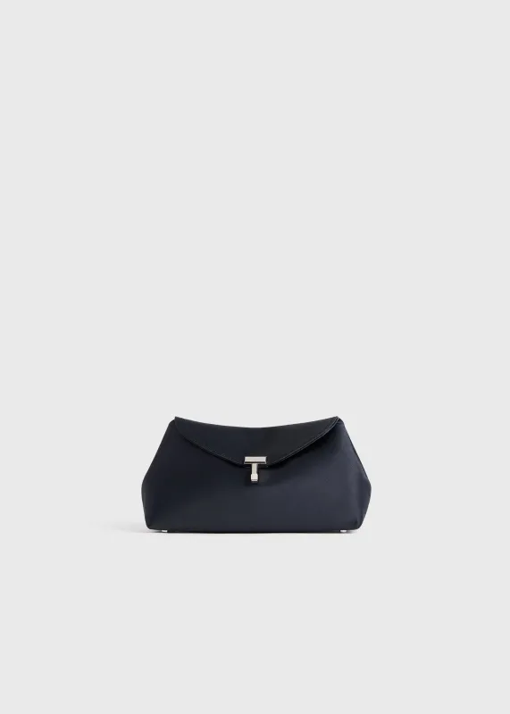 Mini T-lock satin clutch navy sold by Toteme