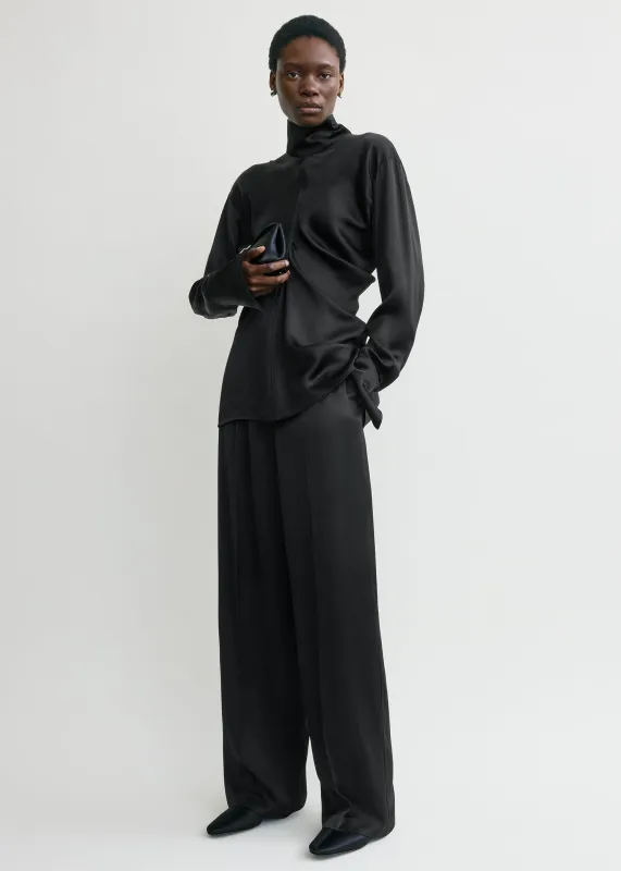 Slouch blouse black sold by Toteme