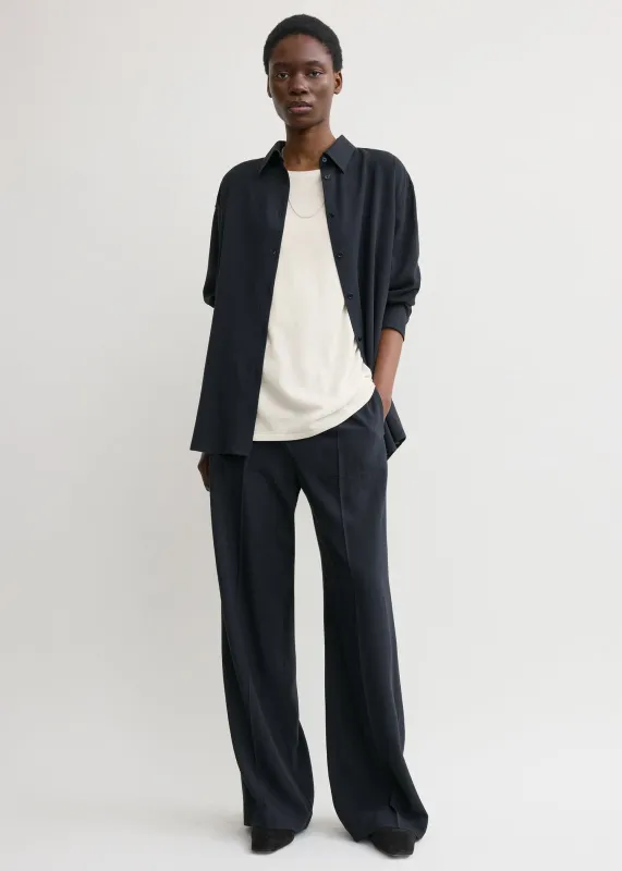 Fluid winter trousers navy sold by Toteme