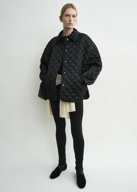 Collared quilted jacket black sold by Toteme