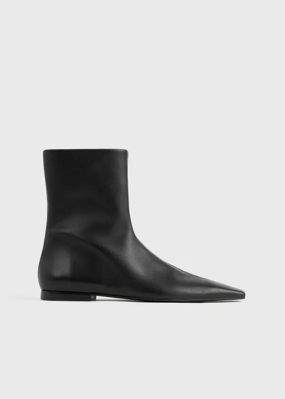 Zipped leather chelsea boots black sold by Toteme