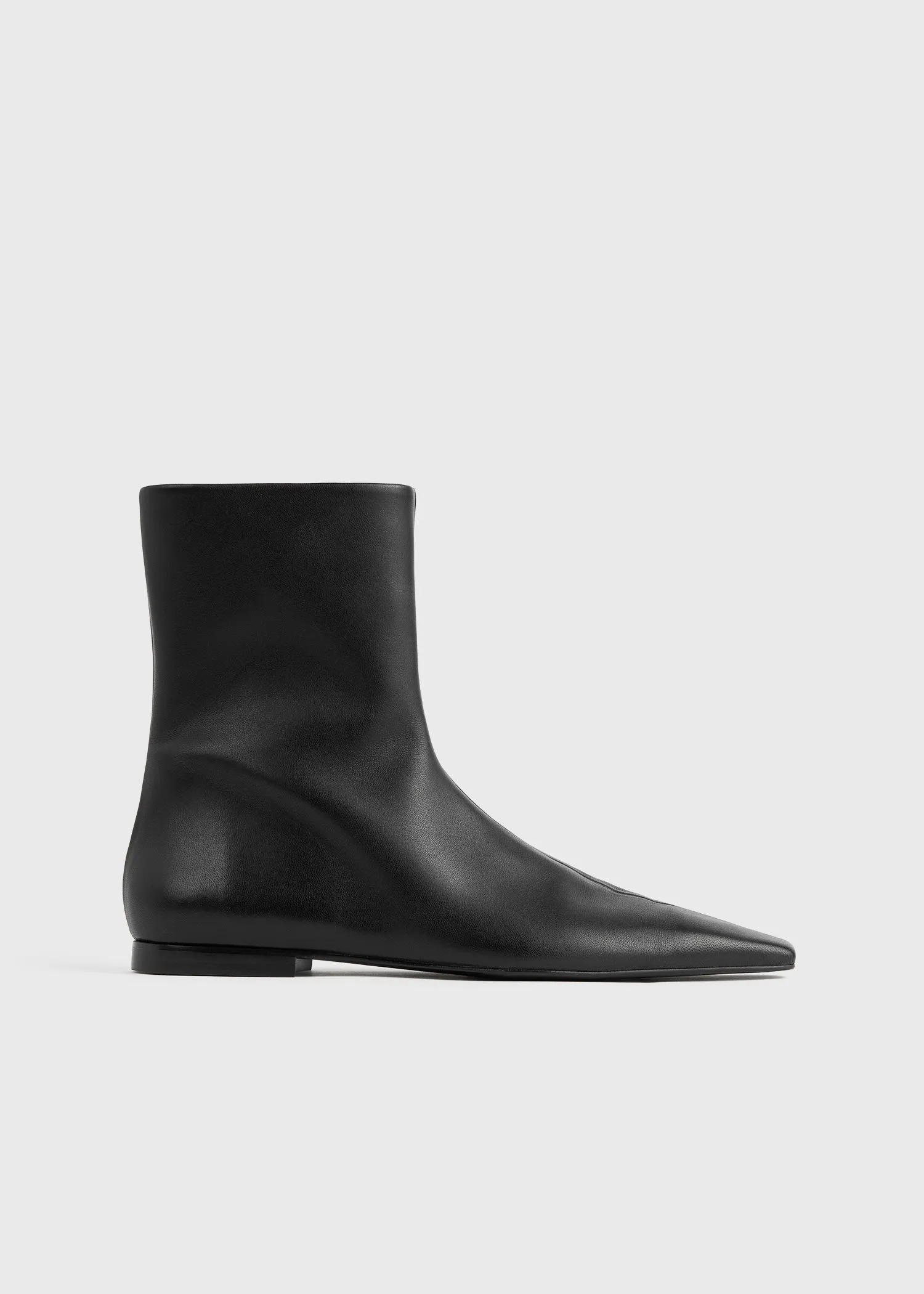 Zipped leather chelsea boots black sold by Toteme