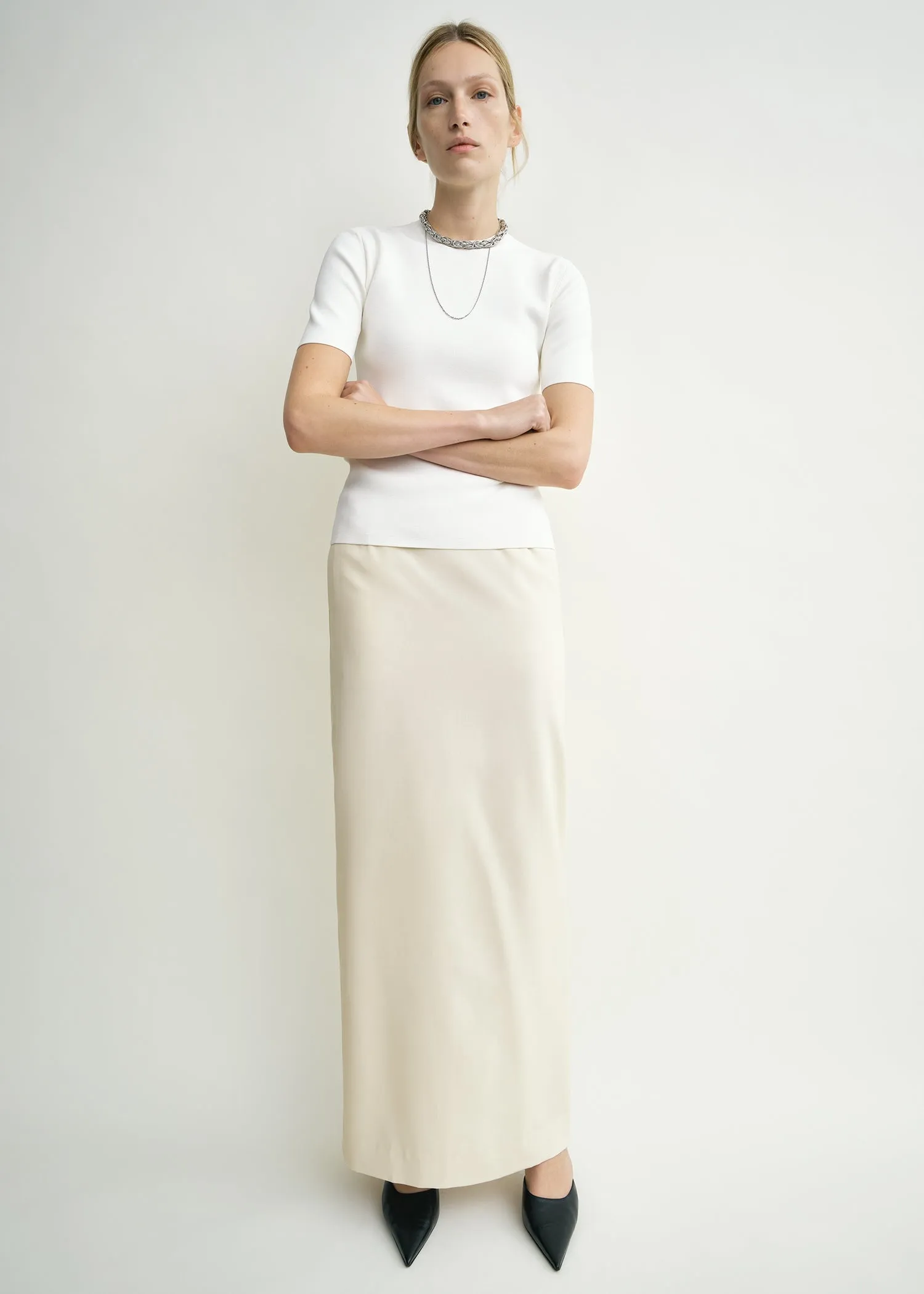 Light wool skirt ecru sold by Toteme