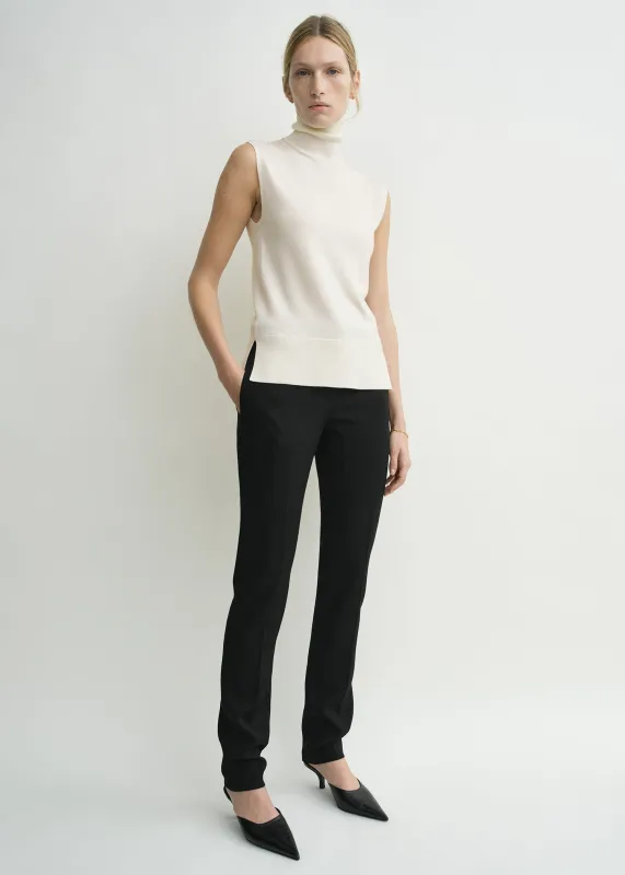 Sleeveless fine turtleneck ecru sold by Toteme