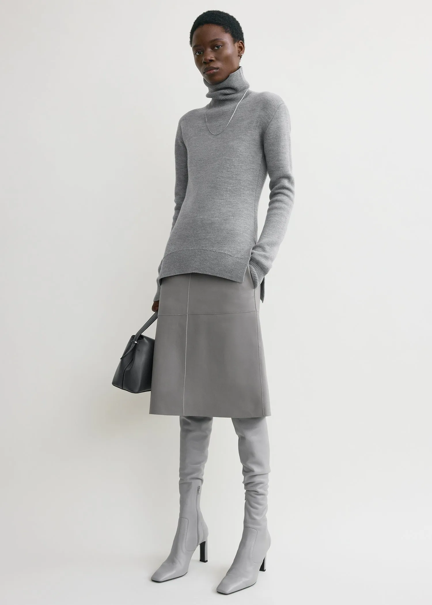 High-neck double knit pale grey sold by Toteme