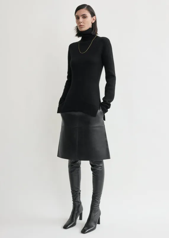 High-neck double knit black sold by Toteme