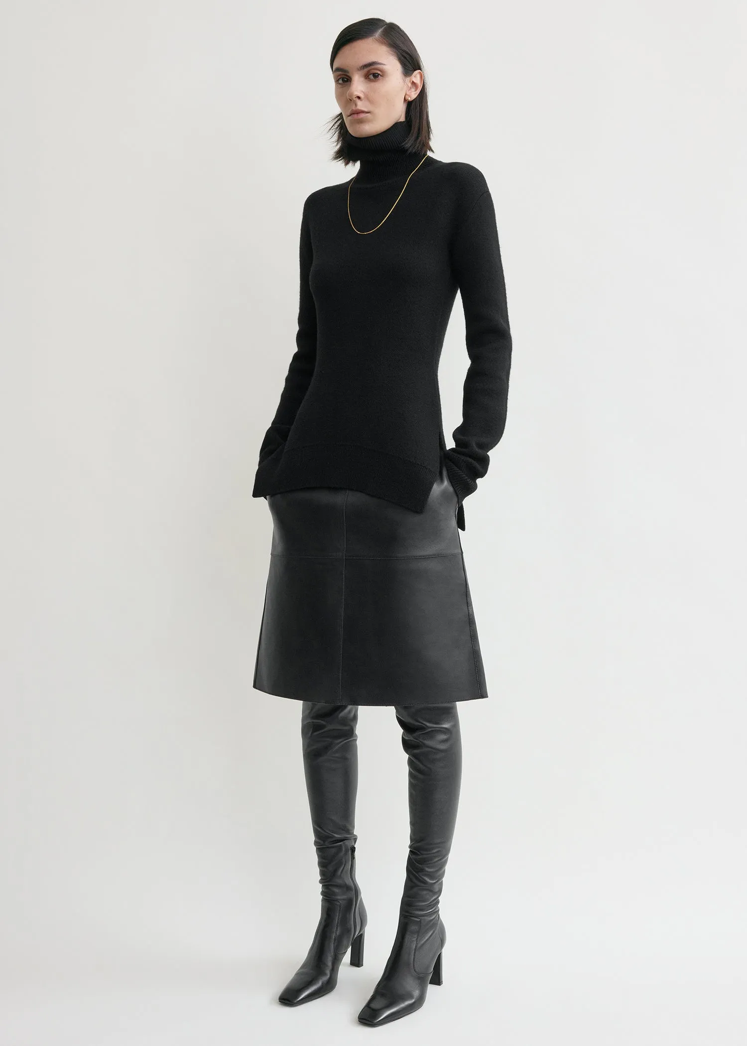 High-neck double knit black sold by Toteme