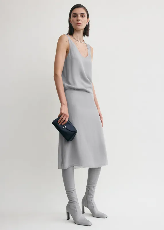Chiffon slip skirt light grey sold by Toteme