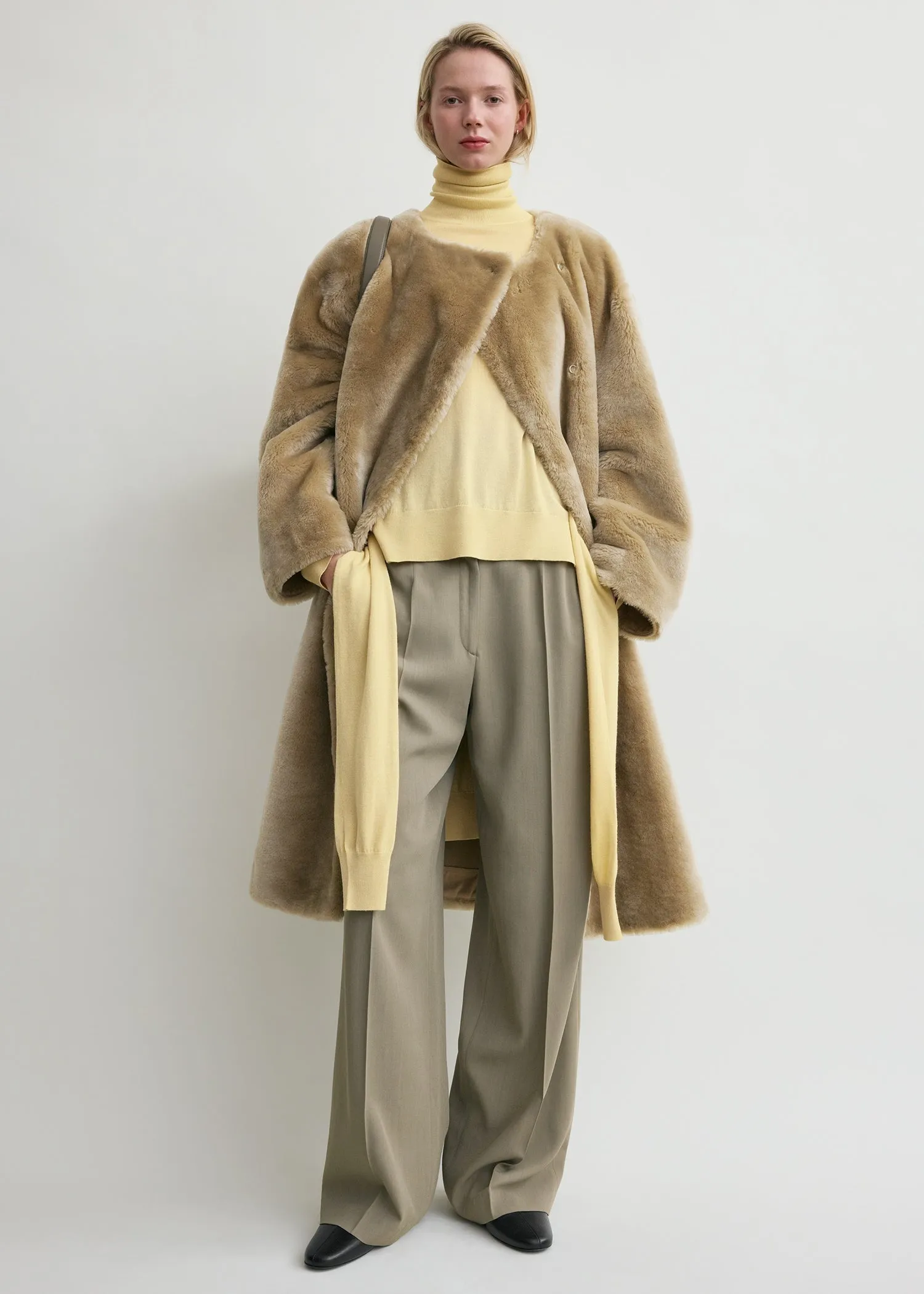 Collarless shearling coat rye sold by Toteme