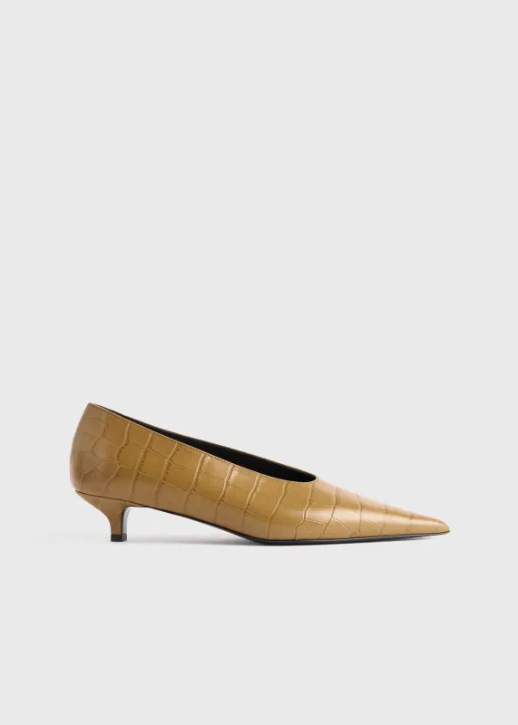 Sharp croco-embossed kitten pumps biscuit sold by Toteme