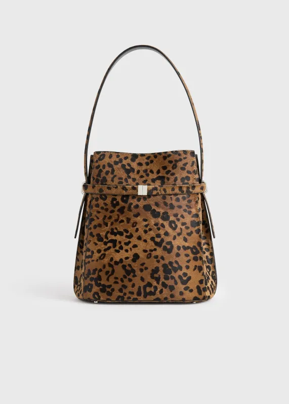 Belted pony hair bucket bag leopard sold by Toteme