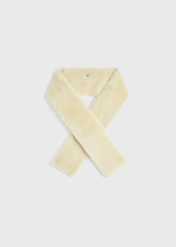 Shearling tuxedo scarf ecru sold by Toteme