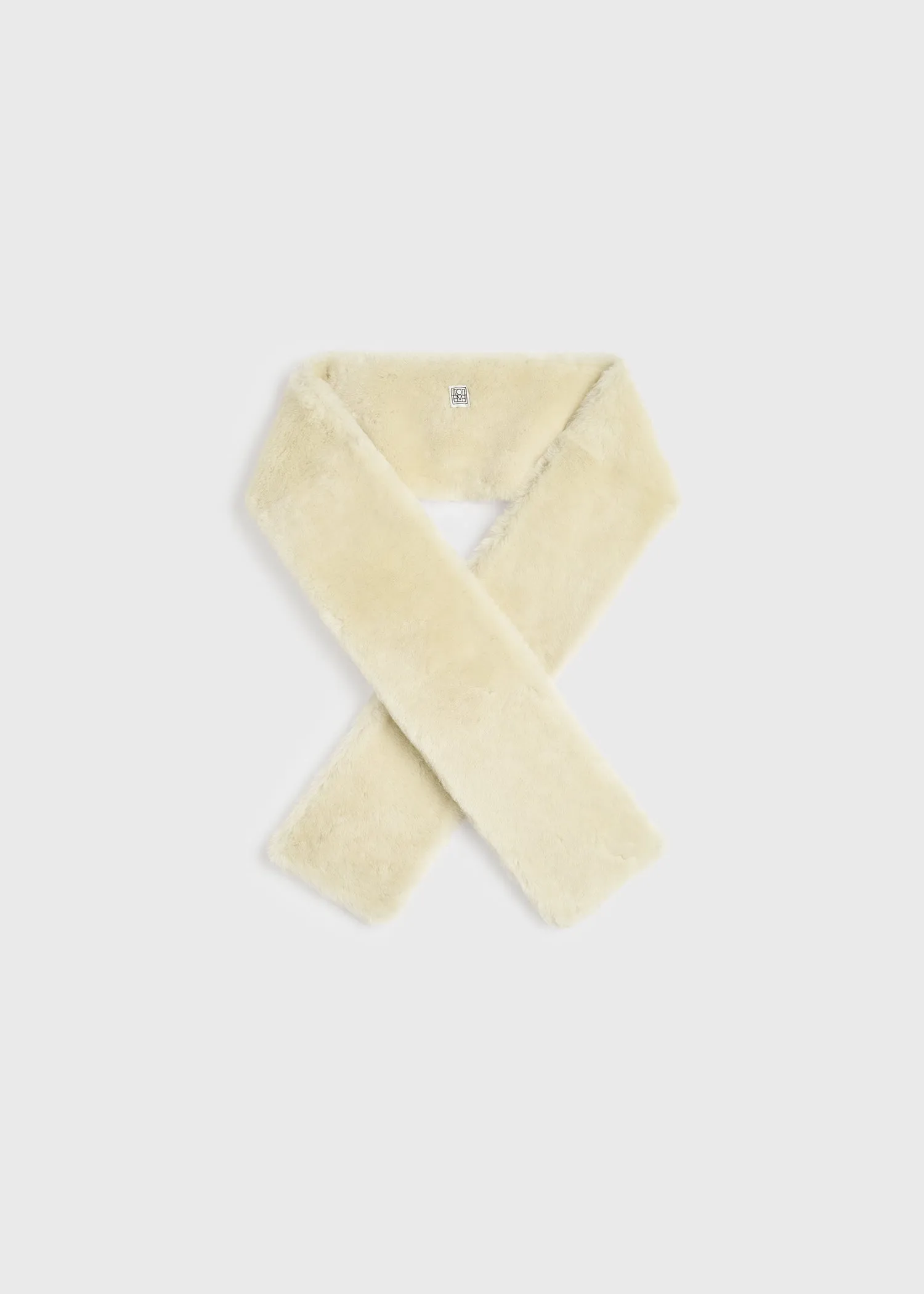 Shearling tuxedo scarf ecru sold by Toteme