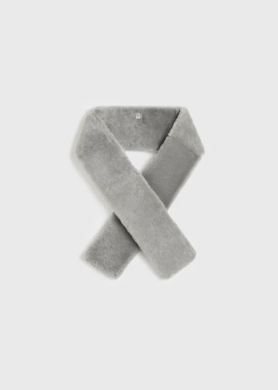 Shearling tuxedo scarf grey sold by Toteme