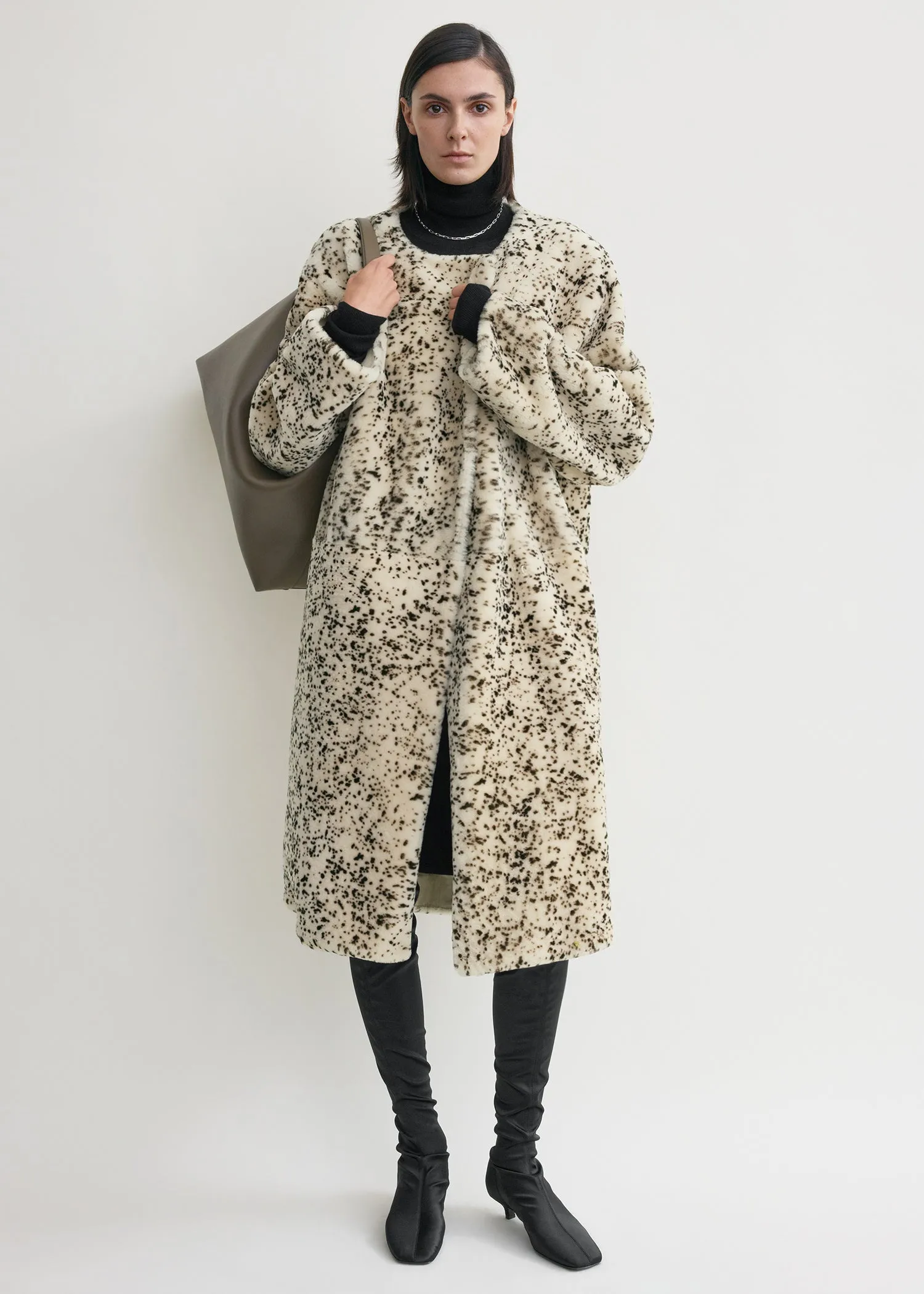 Stracciatella shearling coat black/white sold by Toteme