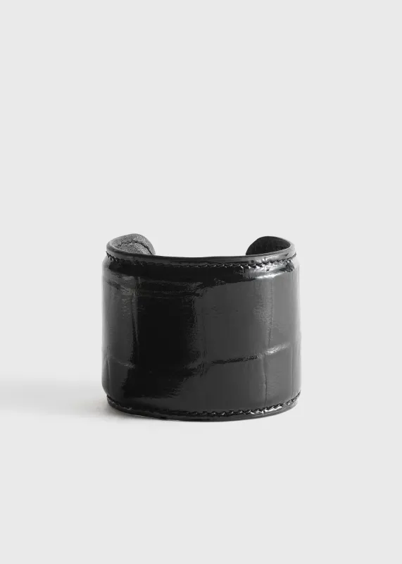 Croco-embossed cuff black made by Toteme