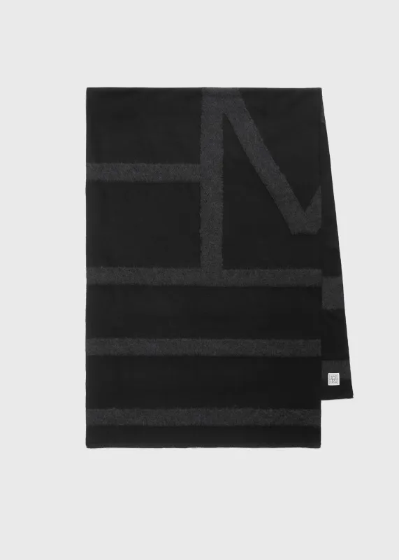 Monogram twill scarf black sold by Toteme