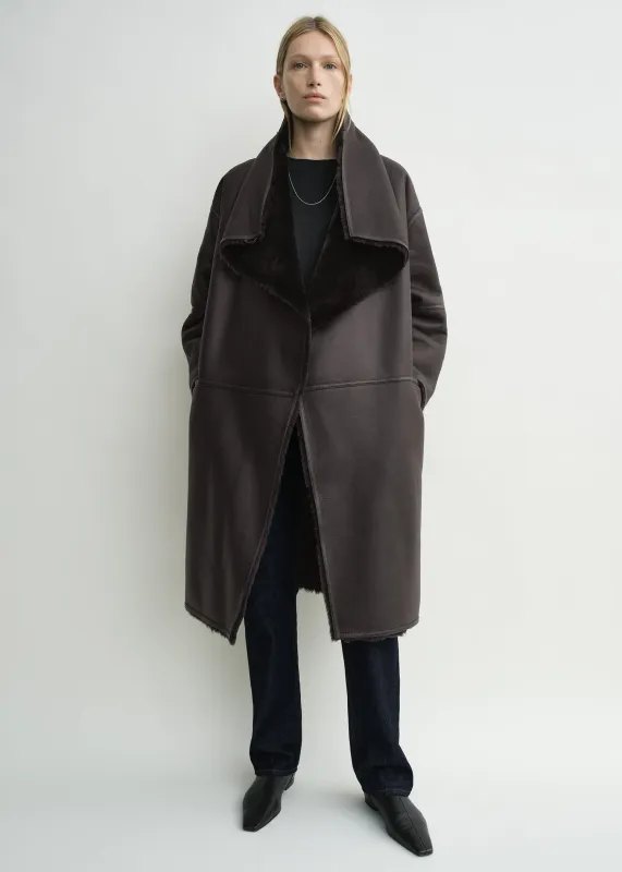 Shearling wrap coat dark brown sold by Toteme