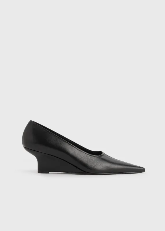 Sharp nappa wedge pumps black sold by Toteme
