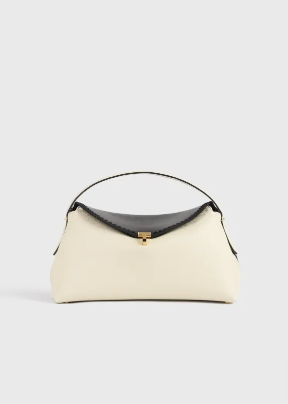T-lock embroidered leather top handle black/milk sold by Toteme