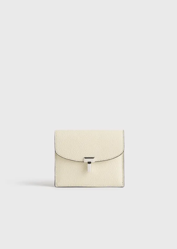 T-lock grained-leather cardholder milk sold by Toteme