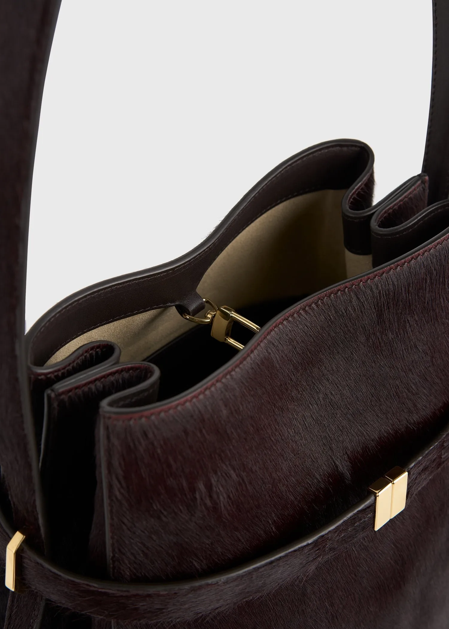 Belted pony hair bucket bag wine sold by Toteme product image thumbnail 5