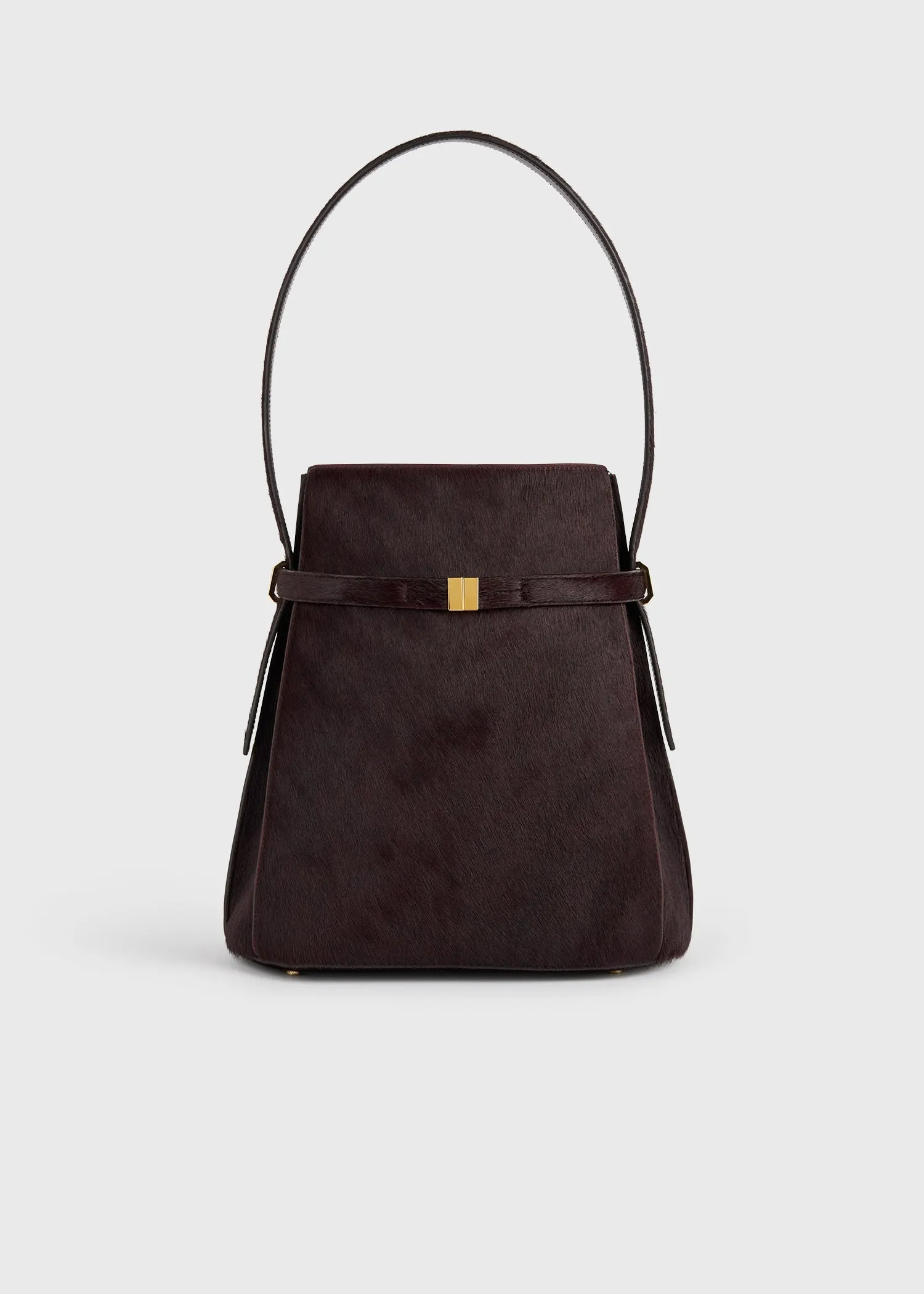 Belted pony hair bucket bag wine sold by Toteme