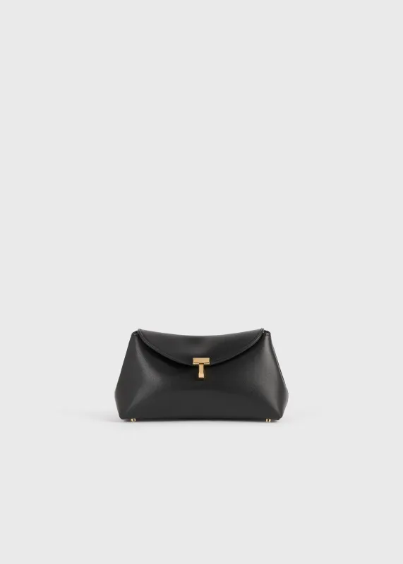 Mini T-lock leather clutch black sold by Toteme